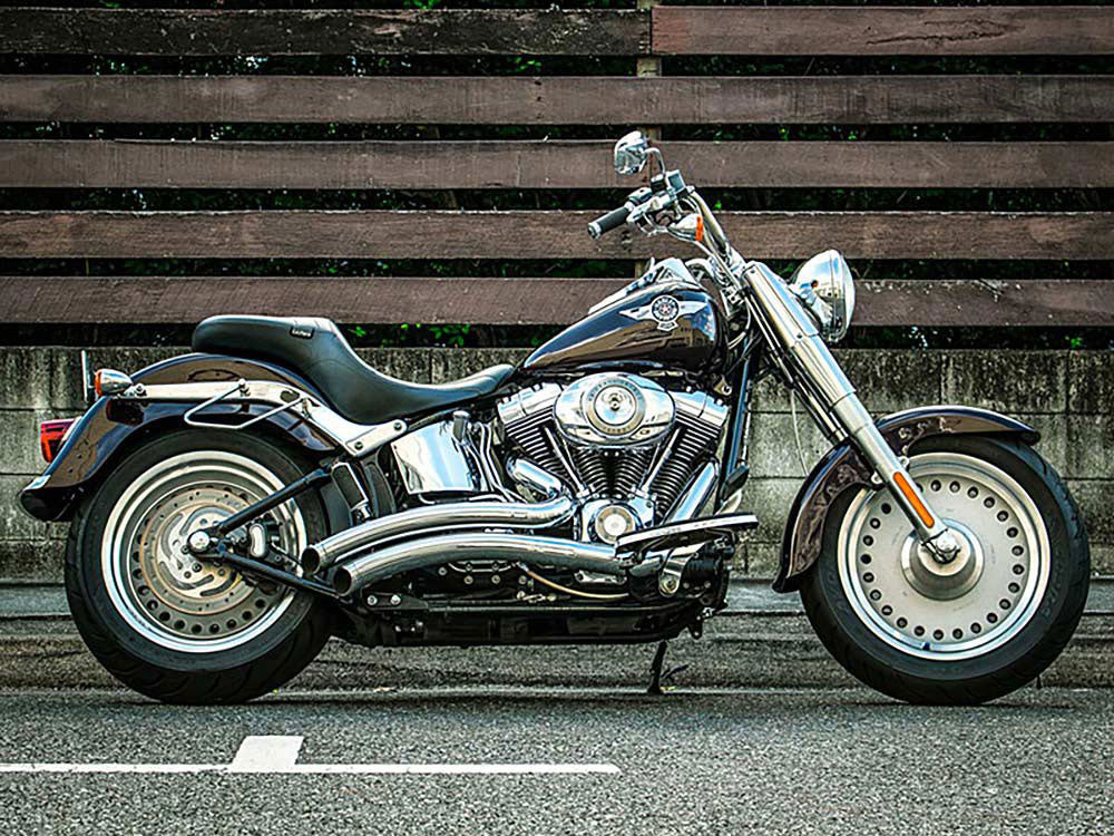 Sharp Curve Radius Exhaust - Chrome with Chrome End Caps. Fits Softail 1986-2017.