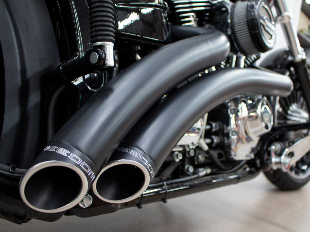 Radical Radius Exhaust – Black with Black End Caps. Fits Softail Breakout 2013-2017 & Rocker 2008-2011 – Freedom Performance Exhaust