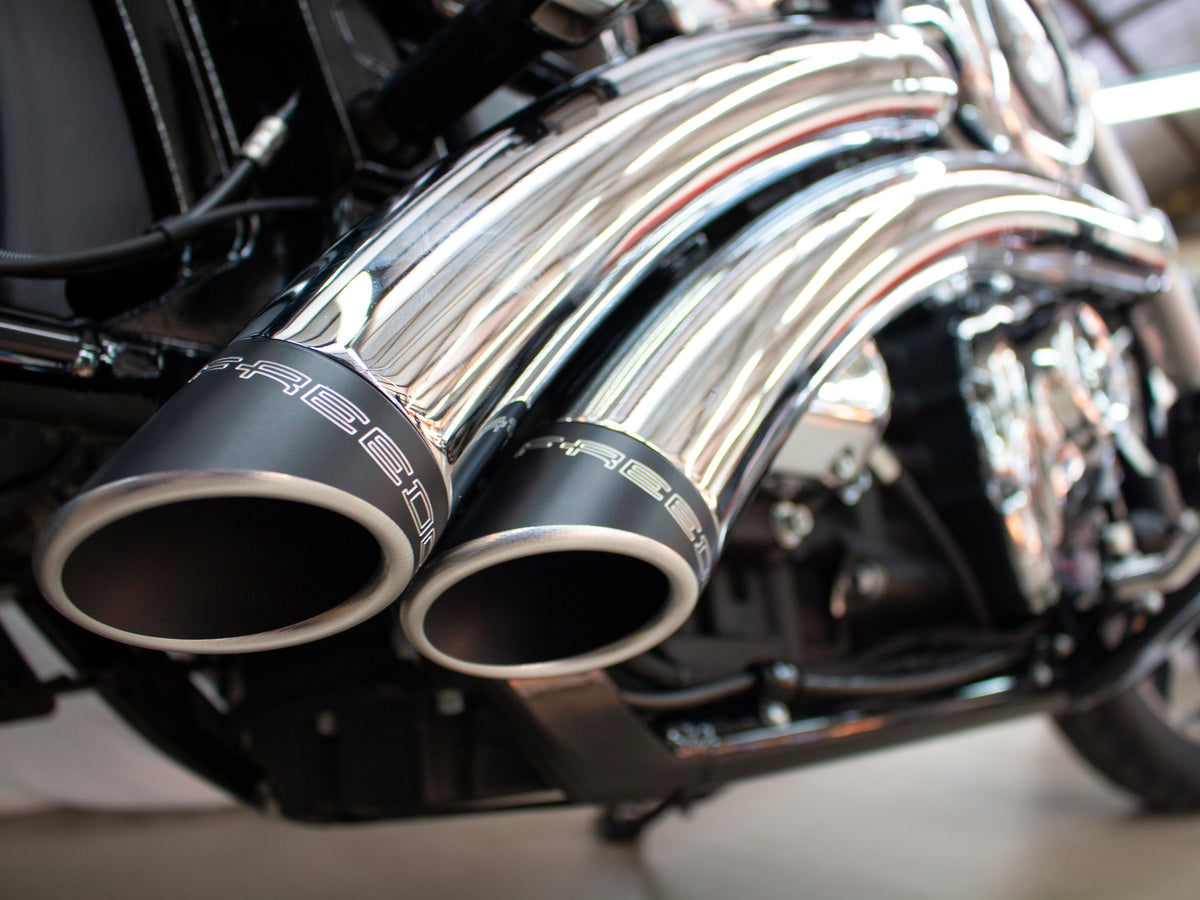 Radical Radius Exhaust - Chrome with Black End Caps. Fits Softail 2018up.