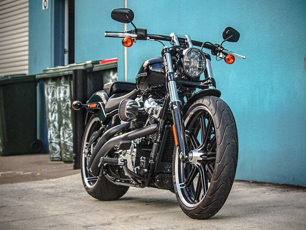 Radical Radius Exhaust – Black with Black End Caps. Fits Softail 2018up – Freedom Performance Exhaust
