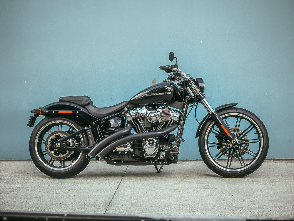 Radical Radius Exhaust – Black with Black End Caps. Fits Softail 2018up – Freedom Performance Exhaust