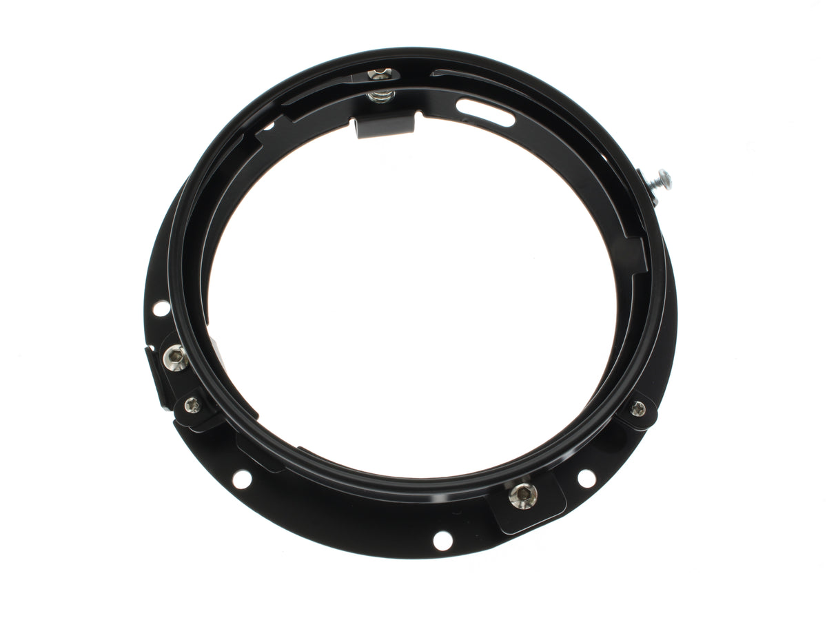 7in. Headlamp Insert Adaptor Bracket - Black. Fits All 2013 earlier Touring & all FreightTrain Nacelle.